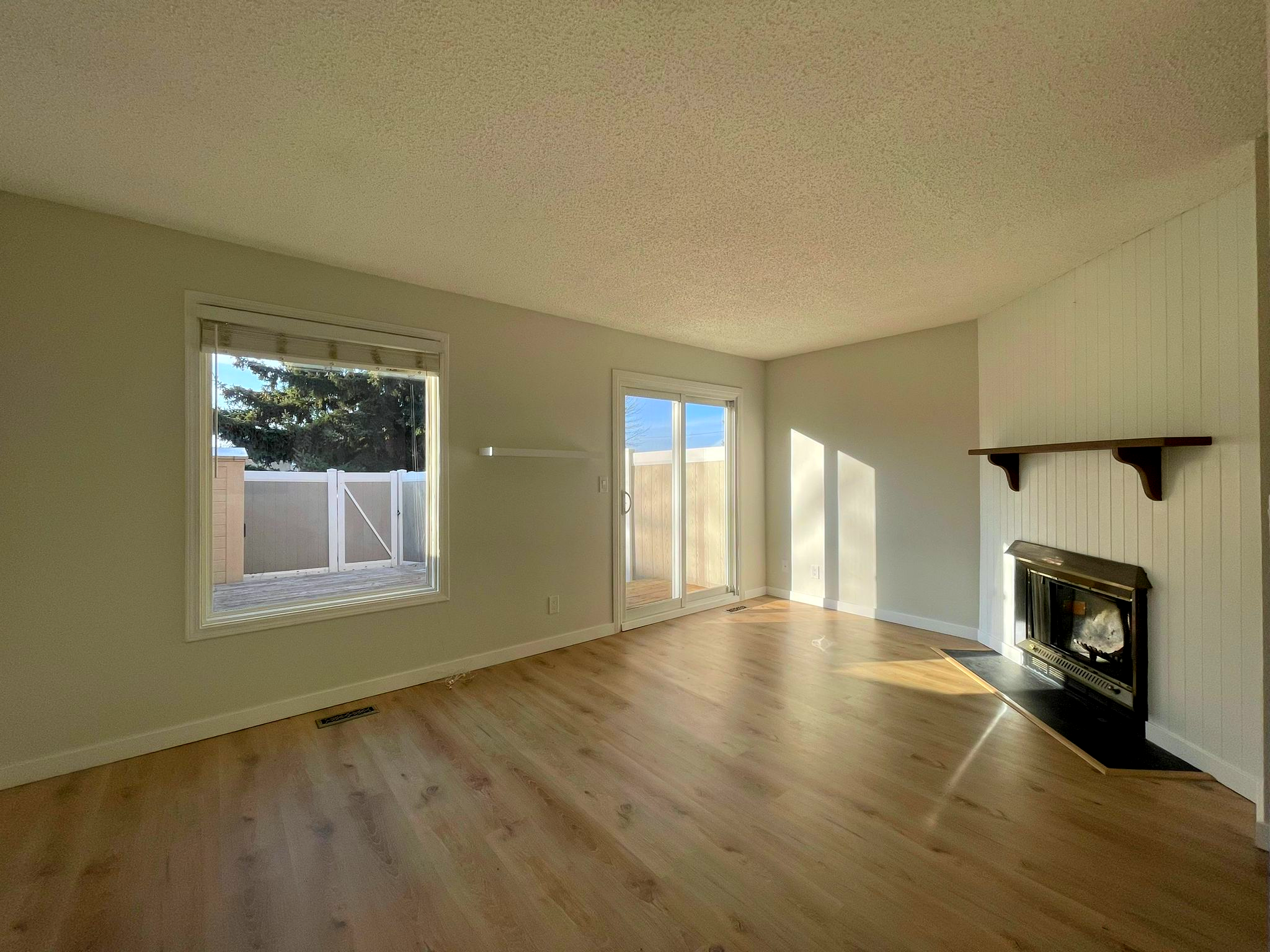 This stunning Northwest townhome features a luxurious 7" wide plank vinyl floor, creating a warm and aesthetically pleasing atmosphere.